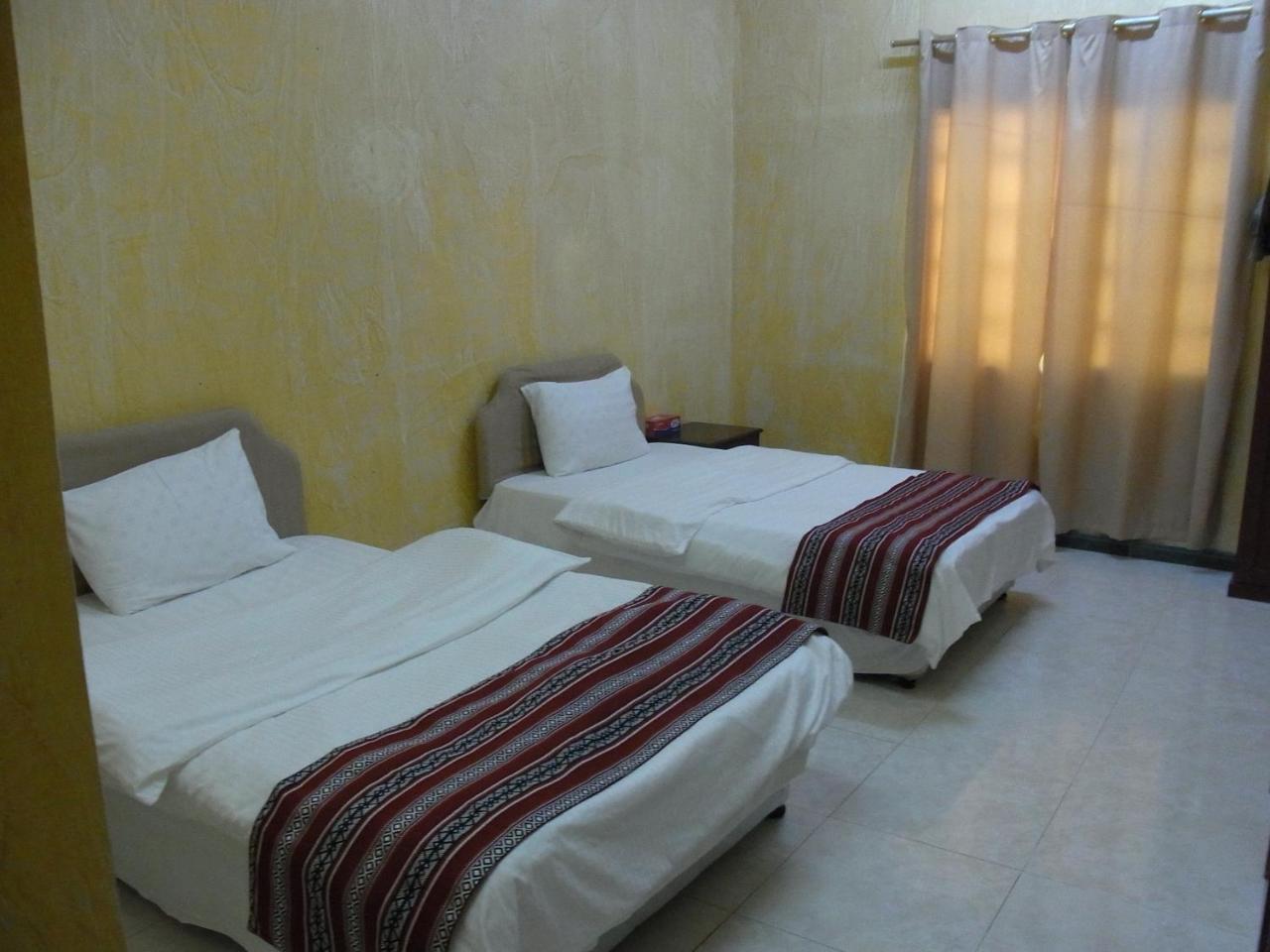 Al Ghazlan Hotel Sinaw Ruddah Luaran gambar